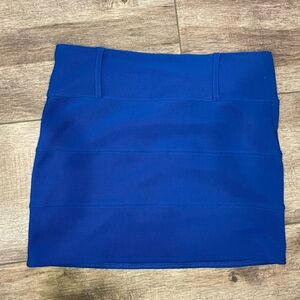 Forever 21 Blue Form Fitting Mini Skirt. Side zipper.